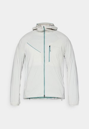 White lightweight jacket with a zippered front, elastic cuffs, and a hood. Features side and chest pockets with contrasting blue zippers.