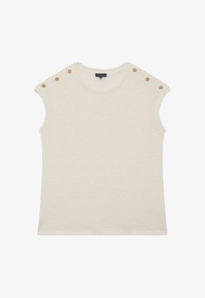 Raitapaita ilman hihoja, väriltään kerma, valmistettu teksturoidusta neuleesta. Paidassa on kolme koristeellista kultanappia yhdellä olalla ja pyöreä kaula-aukko.