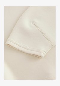 Sélectionné, cream