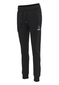 Svarta sweatpants av bomullsblandning, med dragsko i midjan, taperad bendesign och en liten vit logotyp på vänster sida.