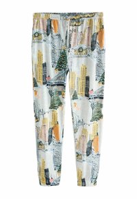 Patterned pajama pants in light fabric, featuring New York City landmarks, trees, and holiday decorations in green, orange, and yellow tones.