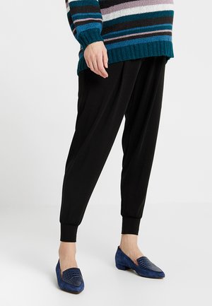 ONCE ON NEVER OFF EASY PANTS - Tracksuit bottoms - black