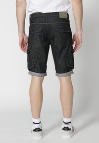 Koroshi BERMUDA COWBOY - Shorts di jeans - denim black denim
