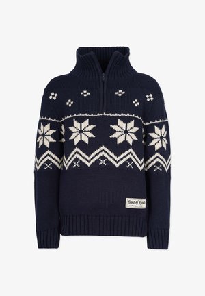 Navy blue knitted sweater with white snowflake patterns, half-zip collar, ribbed cuffs and hem, and a small fabric brand label on the front.