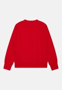 Felpa rossa con colletto tondo, maniche lunghe e polsini e orlo a costine. Tessuto di cotone liscio, in un colore uniforme e senza loghi visibili.
