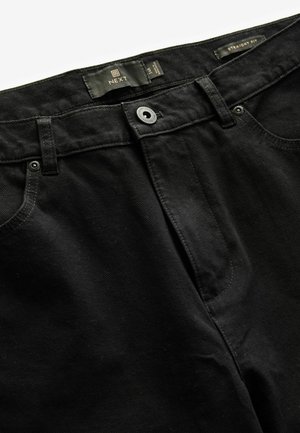 Jeans negros de corte recto hechos de una tela texturizada, con cierre de botón, acentos metálicos y un diseño clásico de cinco bolsillos.