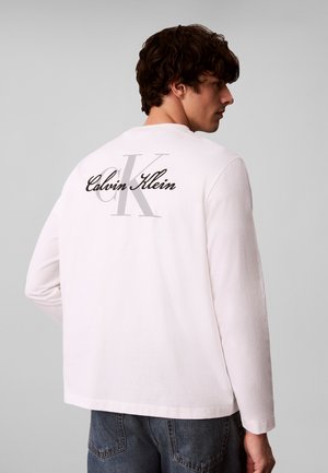Calvin Klein Jeans, MONOLOGO GRAPHIC LONG SLEEVE T-SHIRT - Блуза с дълги ръкави - bright white