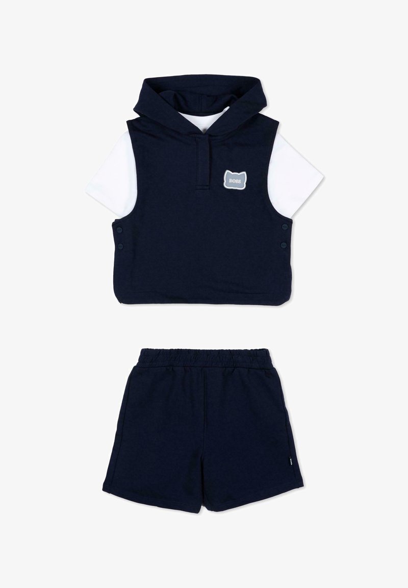 Sweat à capuche sans manches bleu marine avec manches courtes blanches et short assorti bleu marine à taille élastique, tenue décontractée pour enfants.