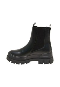 Botas negras de tobillo con paneles laterales elásticos, suela de goma gruesa, material suave y tiradores para facilitar su uso.
