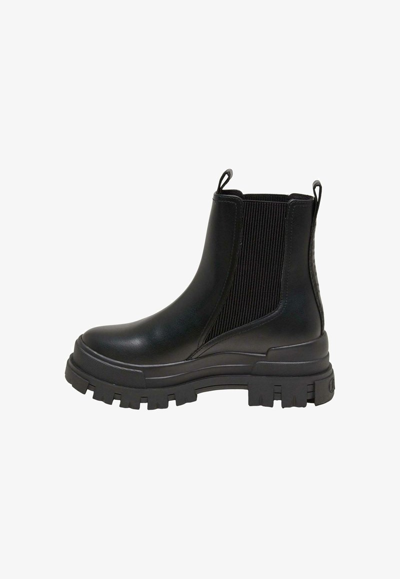 Botas negras de tobillo con paneles laterales elásticos, suela de goma gruesa, material suave y tiradores para facilitar su uso.