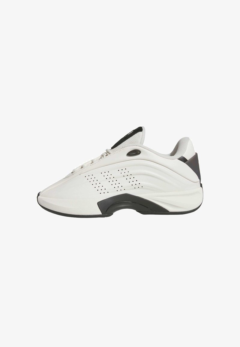 White sneaker with a smooth leather upper, textured side panel featuring perforations, and a black rubber sole. Includes a pull tab at the heel.