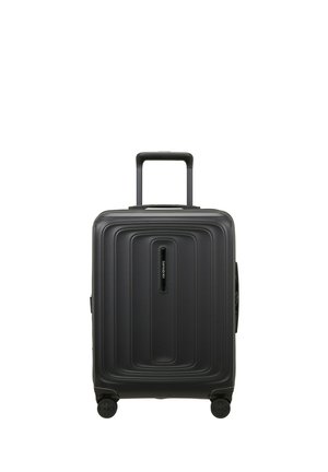Black hard-shell wheeled suitcase with telescoping handle extended, rectangular design, and centered brand label on front panel.