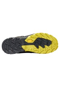 Suola nera e gialla con un motivo di battistrada robusto. Presenta il marchio Vibram e una superficie testurizzata per aderenza e stabilità.