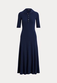 Marineblå polo klänning, korta ärmar, figurnära bodice, utsvängd kjol, har fyra knappar, mjukt stickat tyg, slät textur.