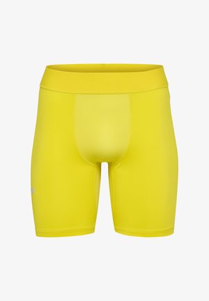 Gelbe Sportshorts mit einem figurbetonten Design, hergestellt aus glattem, dehnbarem Stoff. Sie verfügen über einen breiten Bund und eine kurze Innennaht.