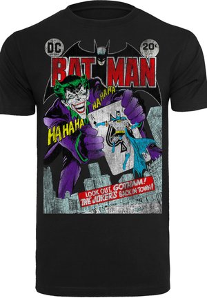 Schwarzes Baumwoll-T-Shirt mit einem Vintage-Comic-Stil Grafik des Jokers und Batman, in lebendigen Farben und mit retro Textakzenten.