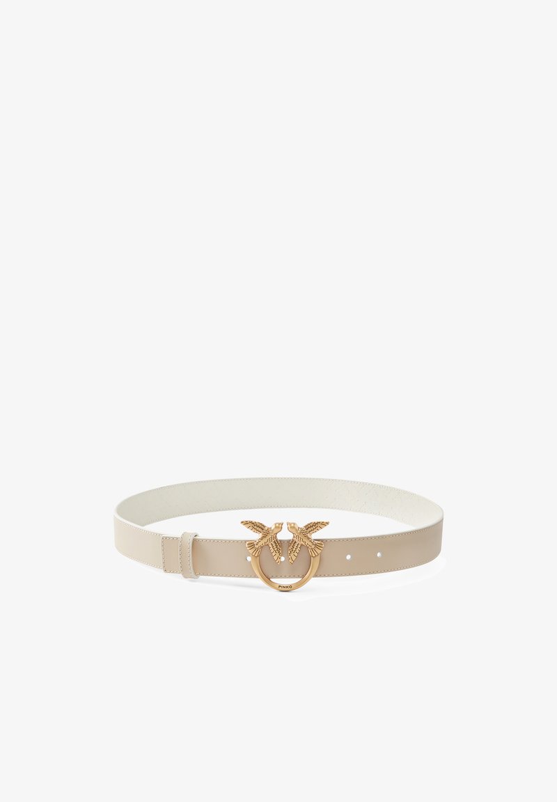 Ceinture en cuir beige avec une texture lisse, dotée d'une boucle double en forme d'oiseau en ton or et d'une sangle ajustable avec plusieurs trous.