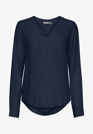 Jūras spēku garās piedurknes blūze ar teksturētu rakstu, V formas kakla izgriezumu un noapaļotu apakšmalu. Izgatavota no viegla auduma ar pogājamiem piedurkņu galiem.