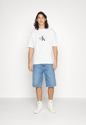 Calvin Klein Jeans MONOLOGO TEE UNISEX - Camiseta estampada - bright white