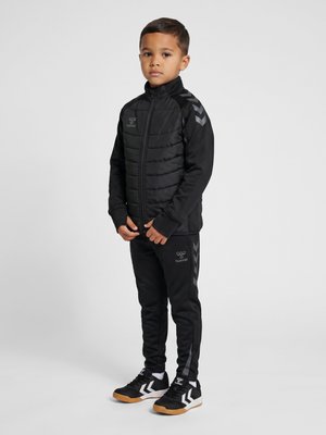Hummel, HUMMEL HMLBTC WINTER TRAINING JACKET KID UNISEX - Trainingsjacke - black