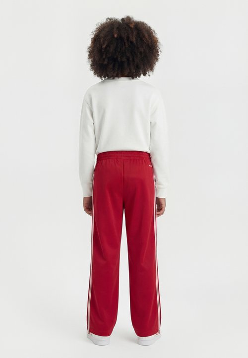 adidas FIREBIRD JUNIOR UNISEX - Tracksuit bottoms - team victory red/warm vanilla — photo 2