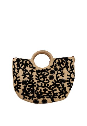 Bolso de paja tejido con asas redondas, con un bordado negro de flores y enredaderas sobre un fondo beige.