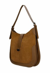 Sac à bandoulière en daim et cuir marron avec une seule bandoulière et un rabat avant sécurisé par une boucle métallique noire en forme d'ailes.