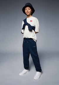 Tommy Hilfiger MINI CORP UNISEX - Jogginghose - dark night navy