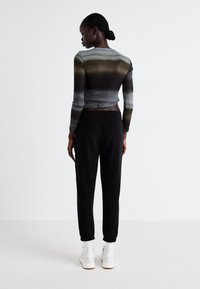 GAP HERITAGE - Træningsbukser - true black