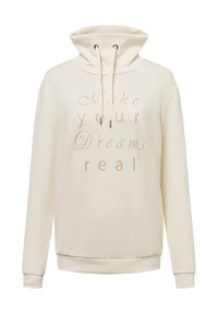 Cream-colored hoodie made of soft fabric, featuring a high collar, drawstring, and the text "Make your Dreams real" in a light font.