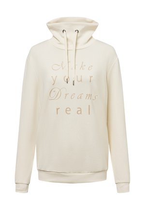 Cream-colored hoodie made of soft fabric, featuring a high collar, drawstring, and the text "Make your Dreams real" in a light font.