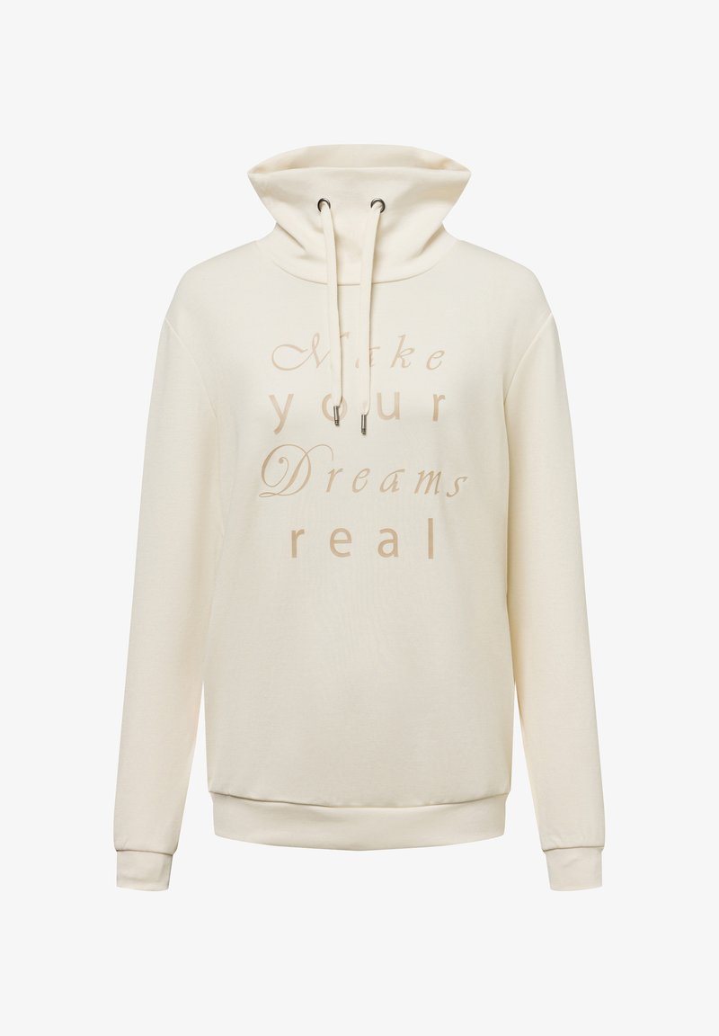 Cream-colored hoodie made of soft fabric, featuring a high collar, drawstring, and the text "Make your Dreams real" in a light font.