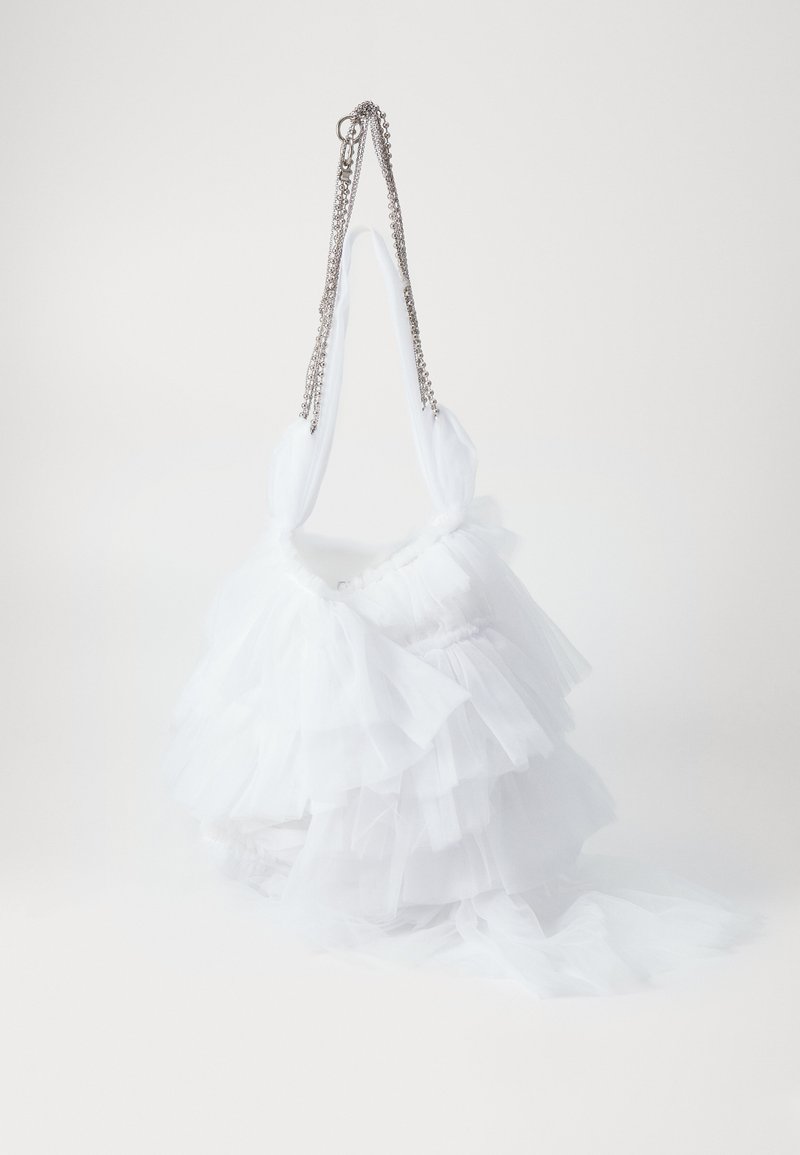 White tulle handbag with a ruffled design, featuring a chain strap and soft fabric accents. Light, airy texture with layered detailing.