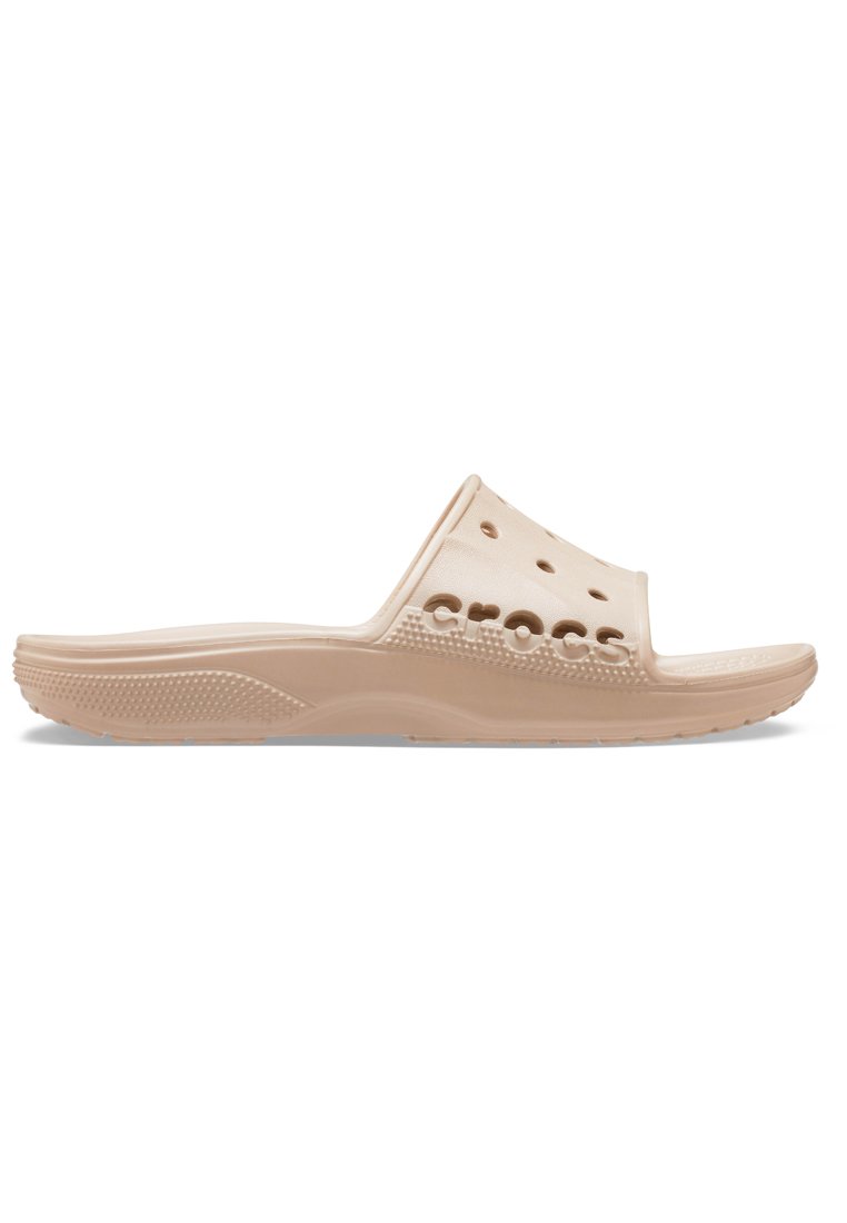 Beige Rutschsandalette aus weichem, flexiblem Material mit Belüftungsöffnungen, einer strukturierten Sohle und erhobenem Markenlogo an der Seite.