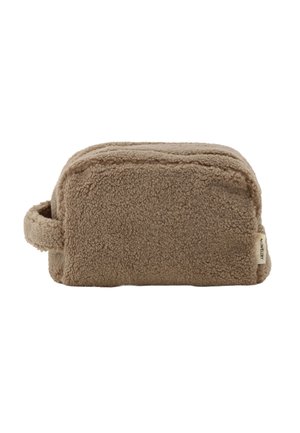 Brown rectangular plush toiletry bag with a side handle and a small fabric brand tag on the right side.