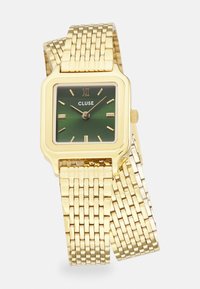 Montre-bracelet carrée en or avec un cadran dégradé vert, des index heures en or et un bracelet en maille. Marque "CLUSE" affichée sur le cadran.