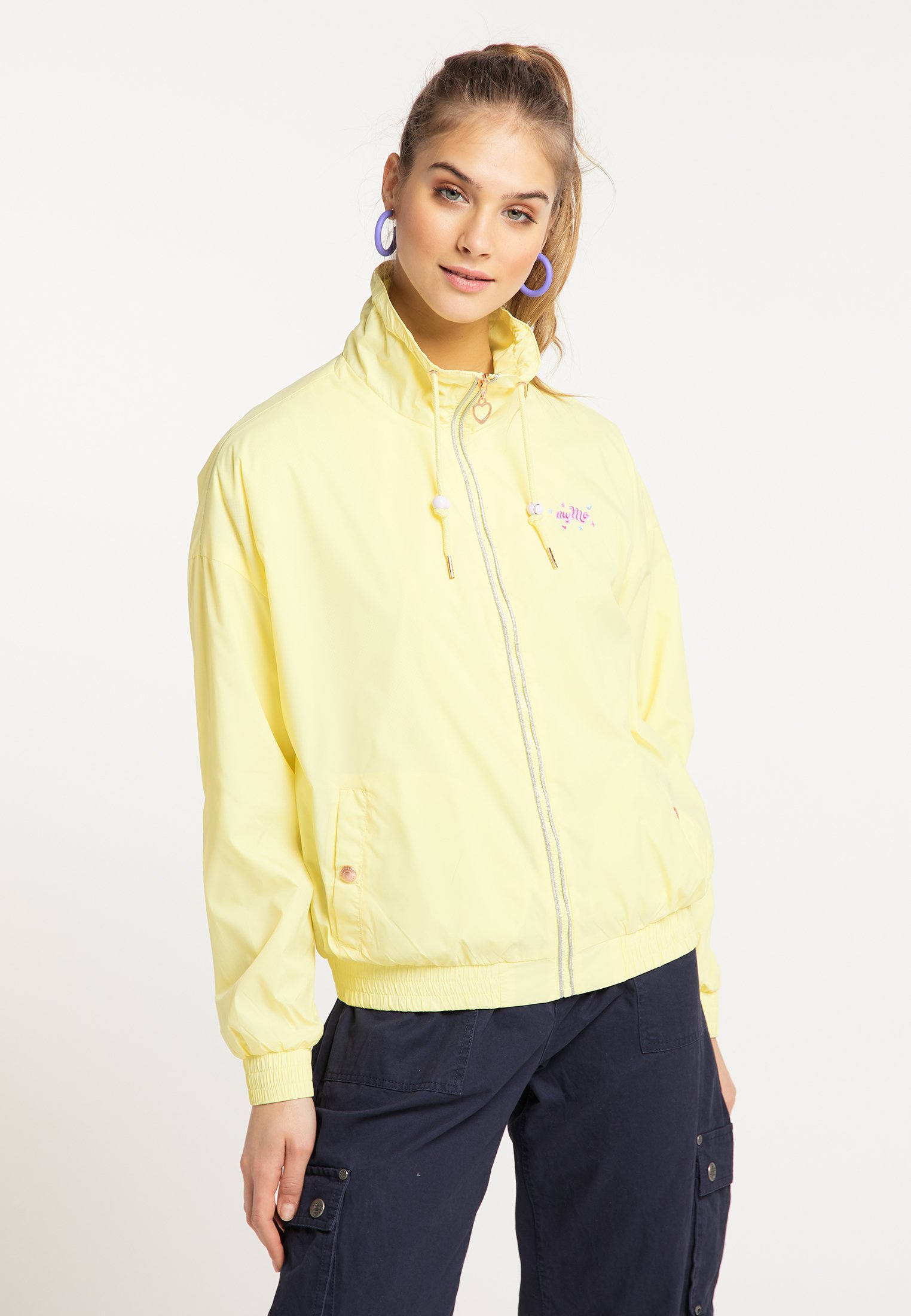 light yellow windbreaker