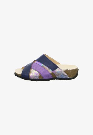 Slide sandal featuring a mixed design of navy and purple leather with iridescent accents and a tan cork footbed, textured black rubber sole.
