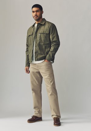 WITH STRETCH - Vaqueros slim fit - tan
