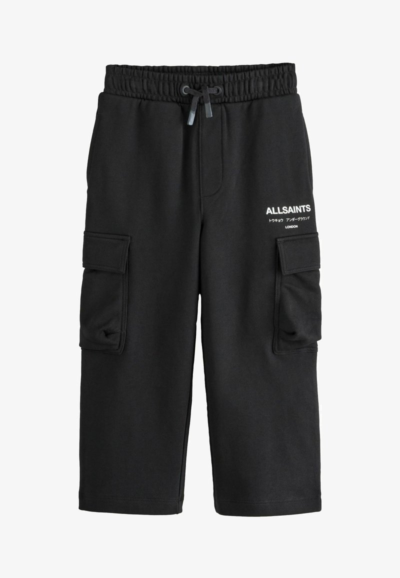 Černé tepláky vyrobené z bavlny s elastickým pasem a šňůrkou. Obsahují dvě boční kapsy a potištěné logo značky.