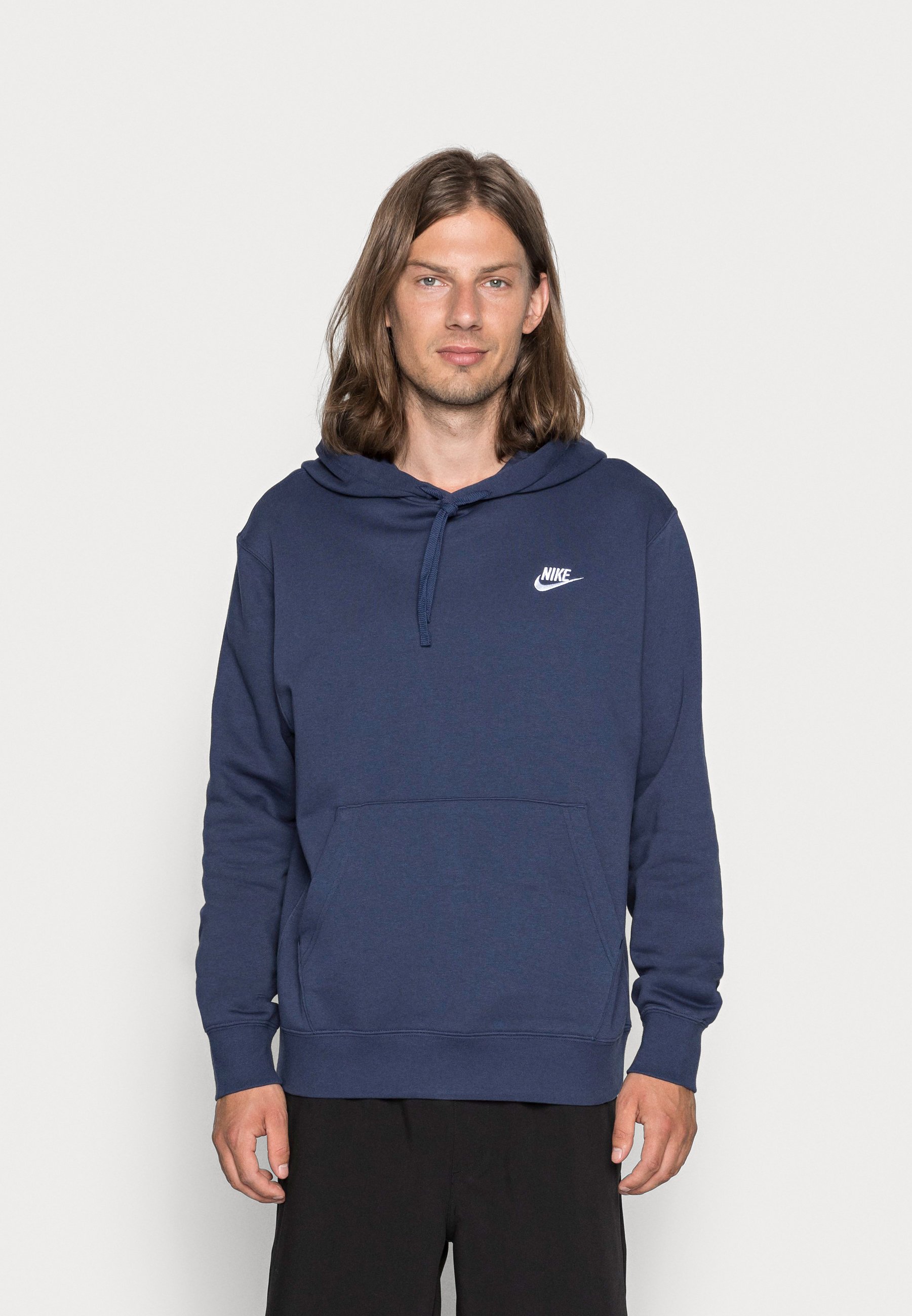 navy blue nike hoodie and sweatpants