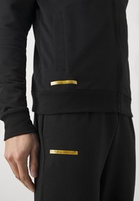 EA7 Emporio Armani Tracksuit - black/gold