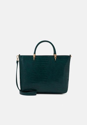 Dark green, crocodile-textured tote bag with two top handles and a detachable shoulder strap. Gold-tone hardware accents throughout.