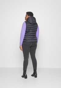 CARNEW TAHOE HOOD WAISTCOAT