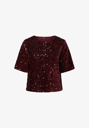 Burgundia sädelü t-särk lühikeste varrukatega ja ümaraga kaelusega, millel on tekstureeritud pind ja lõtv, mugav lõige.