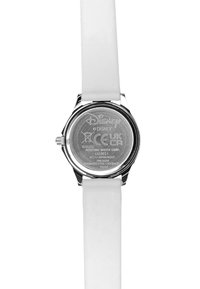 Retro in acciaio inossidabile del quadrante di un orologio con cinturino in silicone bianco. Logo Disney e dettagli del modello incisi sul retro.