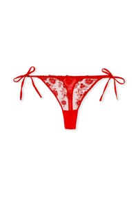 Roter transparenter Spitzen-Thong mit detaillierter floraler Stickerei. Verfügt über Bindebändchen an beiden Seiten und einen soliden roten Stoffrücken.