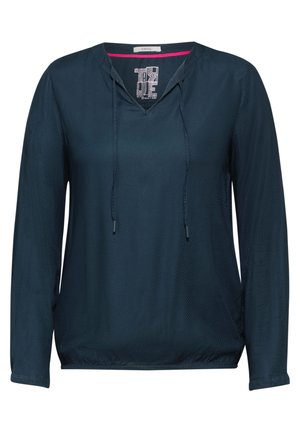 Ciemnoniebieska bluzka z długim rękawem i dekoltem w kształcie litery V, z kapturem na sznurku oraz teksturowanym materiałem z małymi perforacjami. Regulowany dół z elastycznym wykończeniem.
