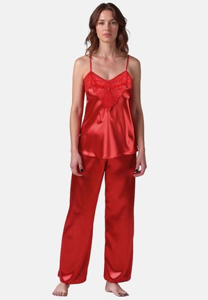 Rotes Satin-Pajama-Set mit einem Camisole mit Spitze und verstellbaren Trägern, kombiniert mit lockeren Satin-Hosen. Durchgehend glatte Textur.
