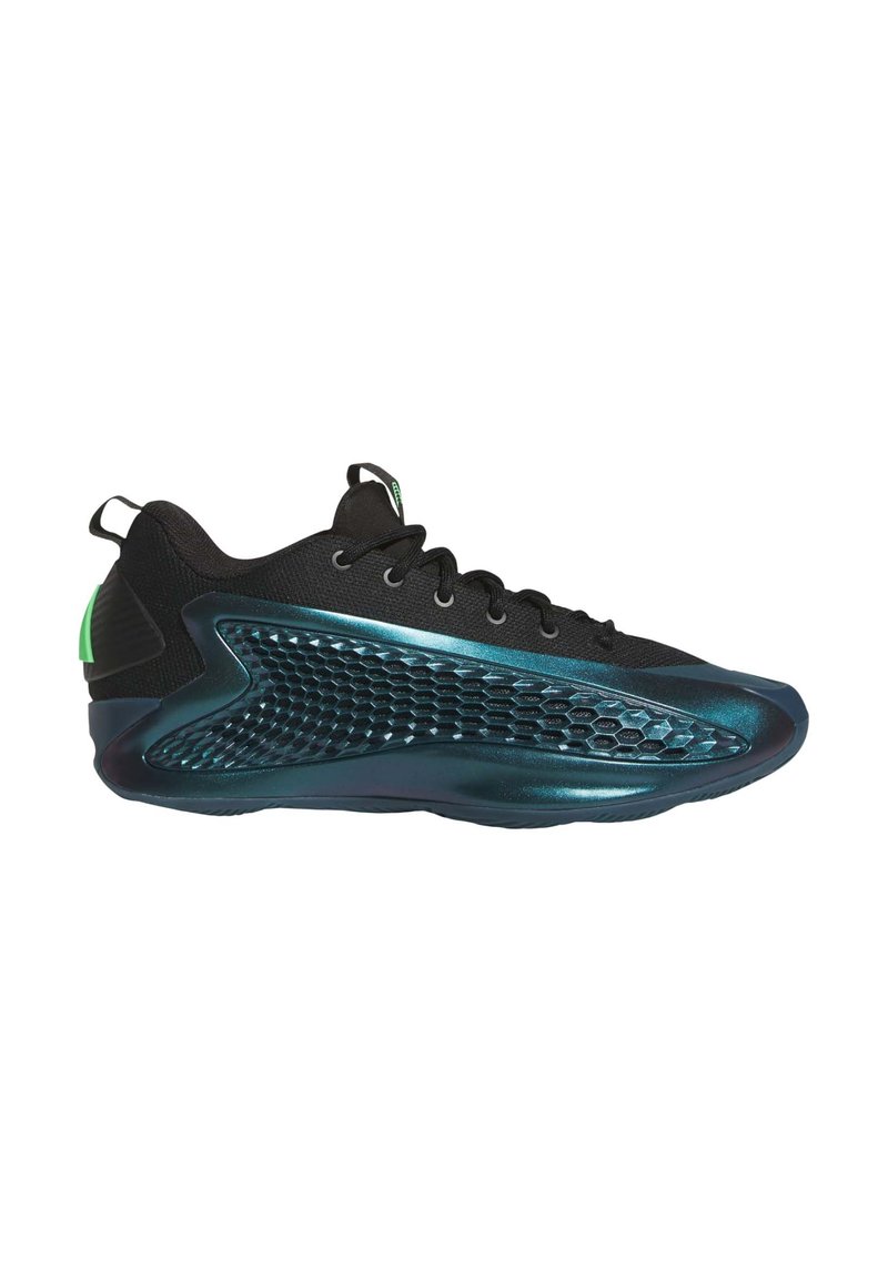Black athletic shoe featuring a textured upper, honeycomb design on the side, and a glossy teal outsole with green accents.